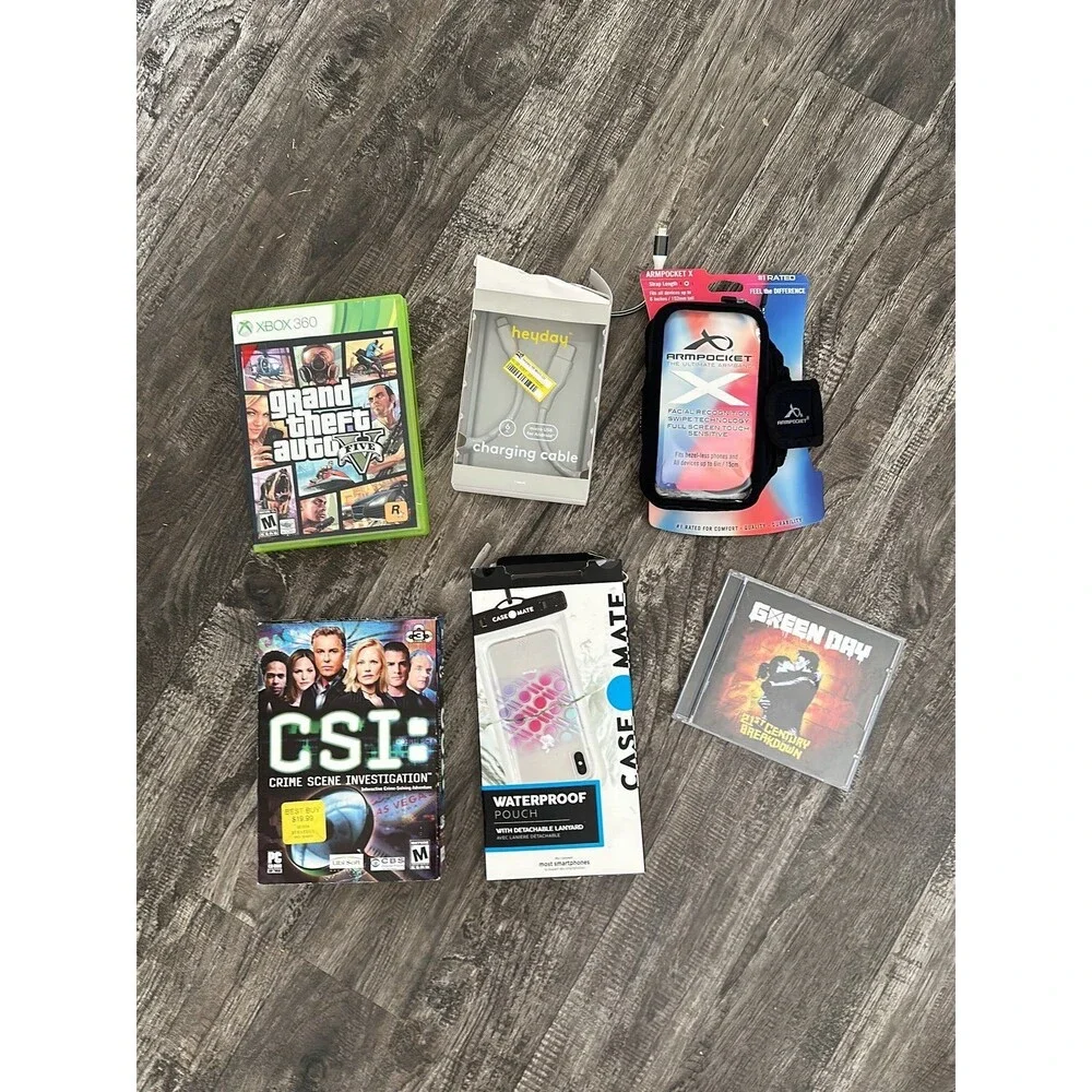 Lot of cellphone accessories, Xbox games and CD